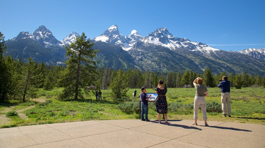 Grand Teton National Park showing landscape views, signage and tranquil scenes