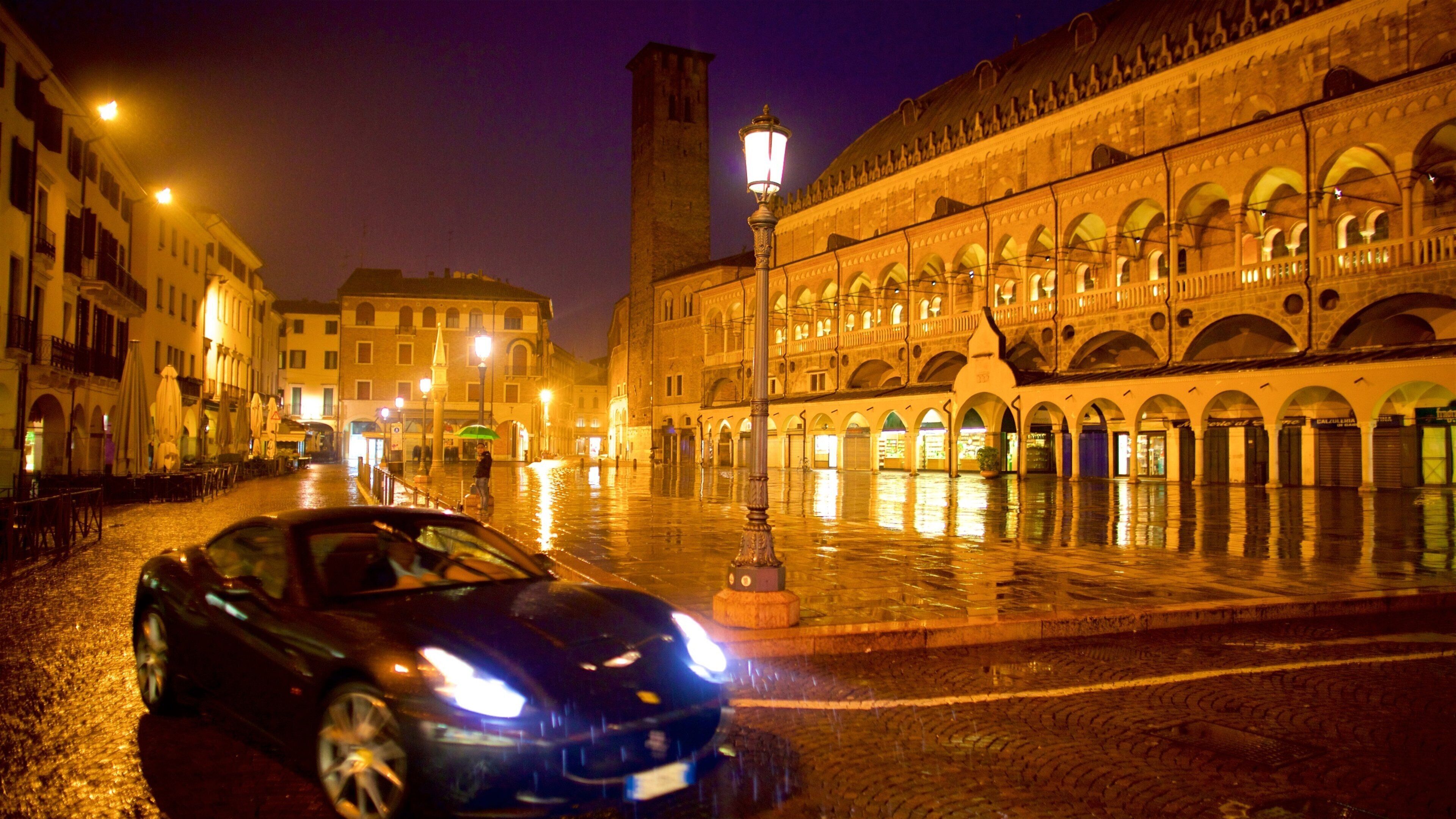 Piazza dei Frutta which includes a city and night scenes