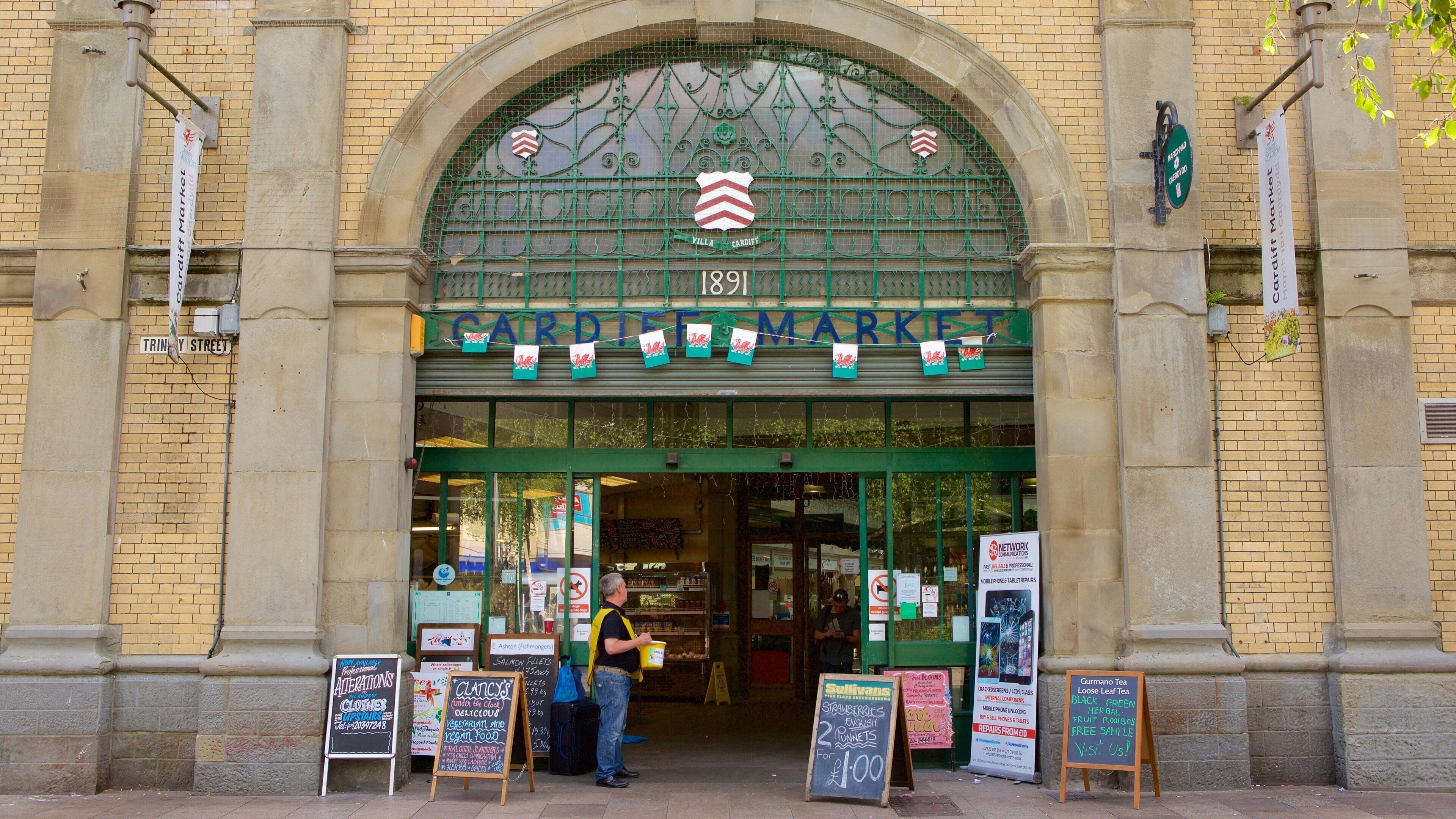 Cardiff which includes signage, shopping and markets