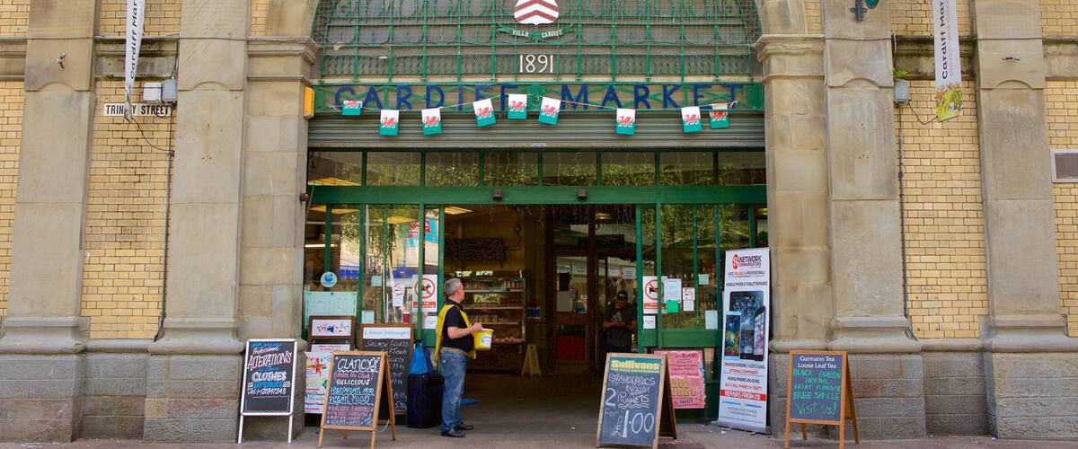 Cardiff which includes signage, shopping and markets
