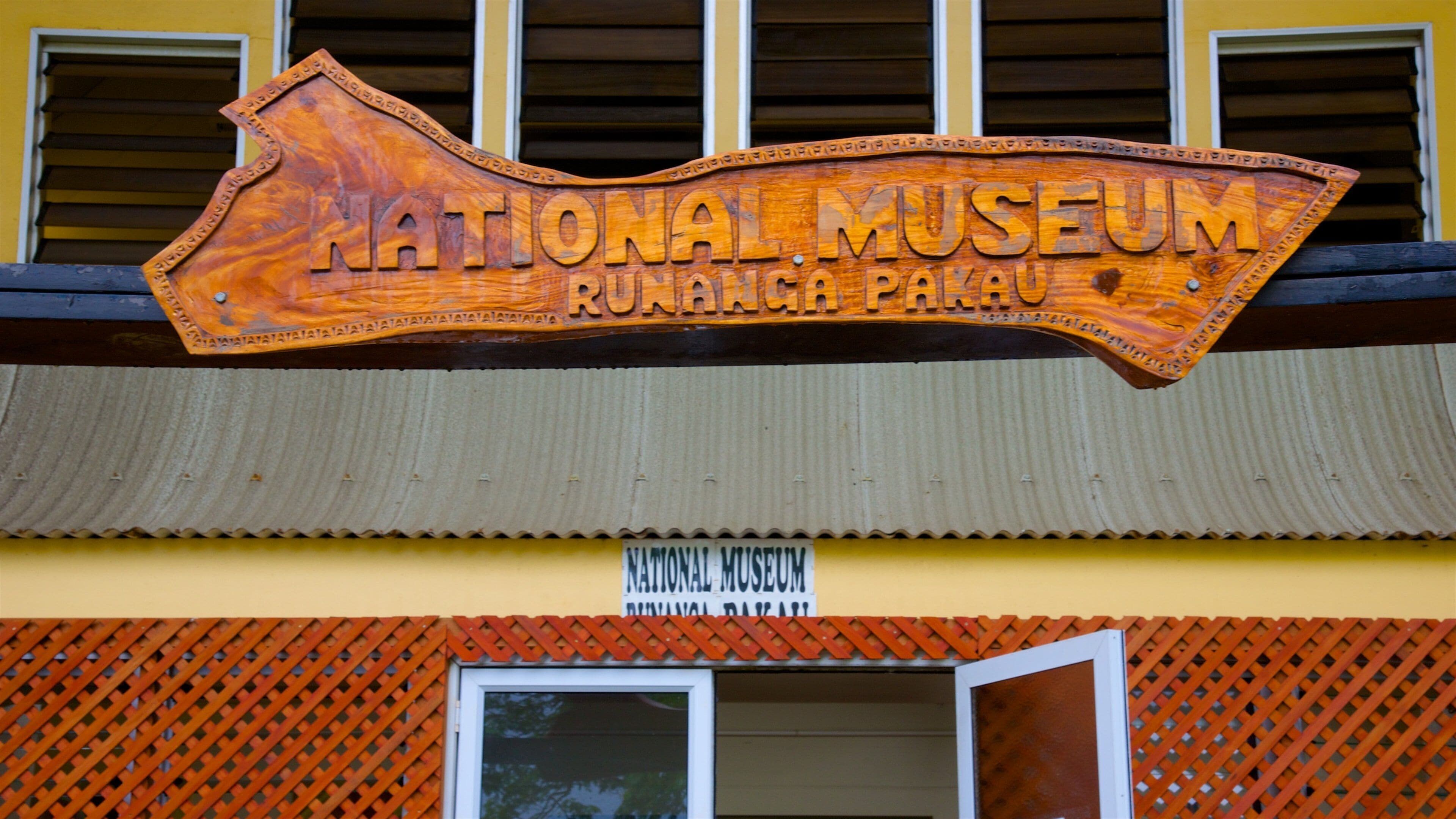 A wooden sign for the National Museum in Rurangwa Park.