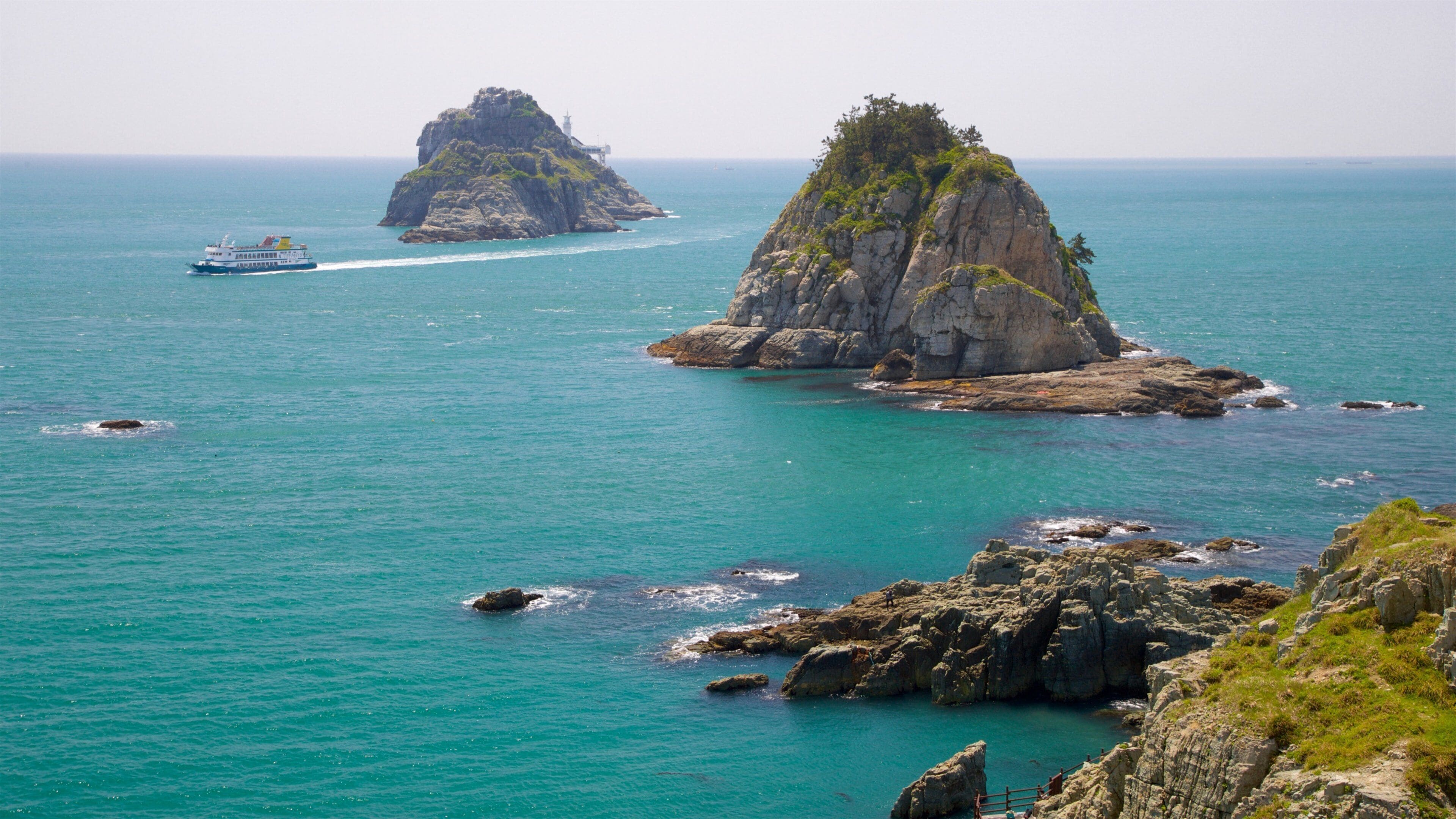 Pusan presenterar båtkörning, öfoton och kustutsikter