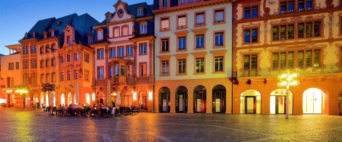 Marktbrunnen which includes heritage elements, night scenes and a square or plaza