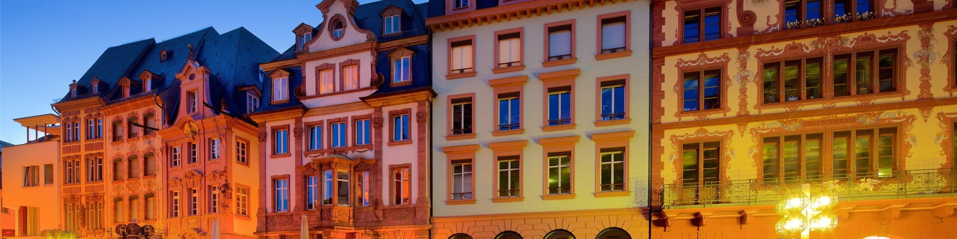 Marktbrunnen which includes heritage elements, night scenes and a square or plaza