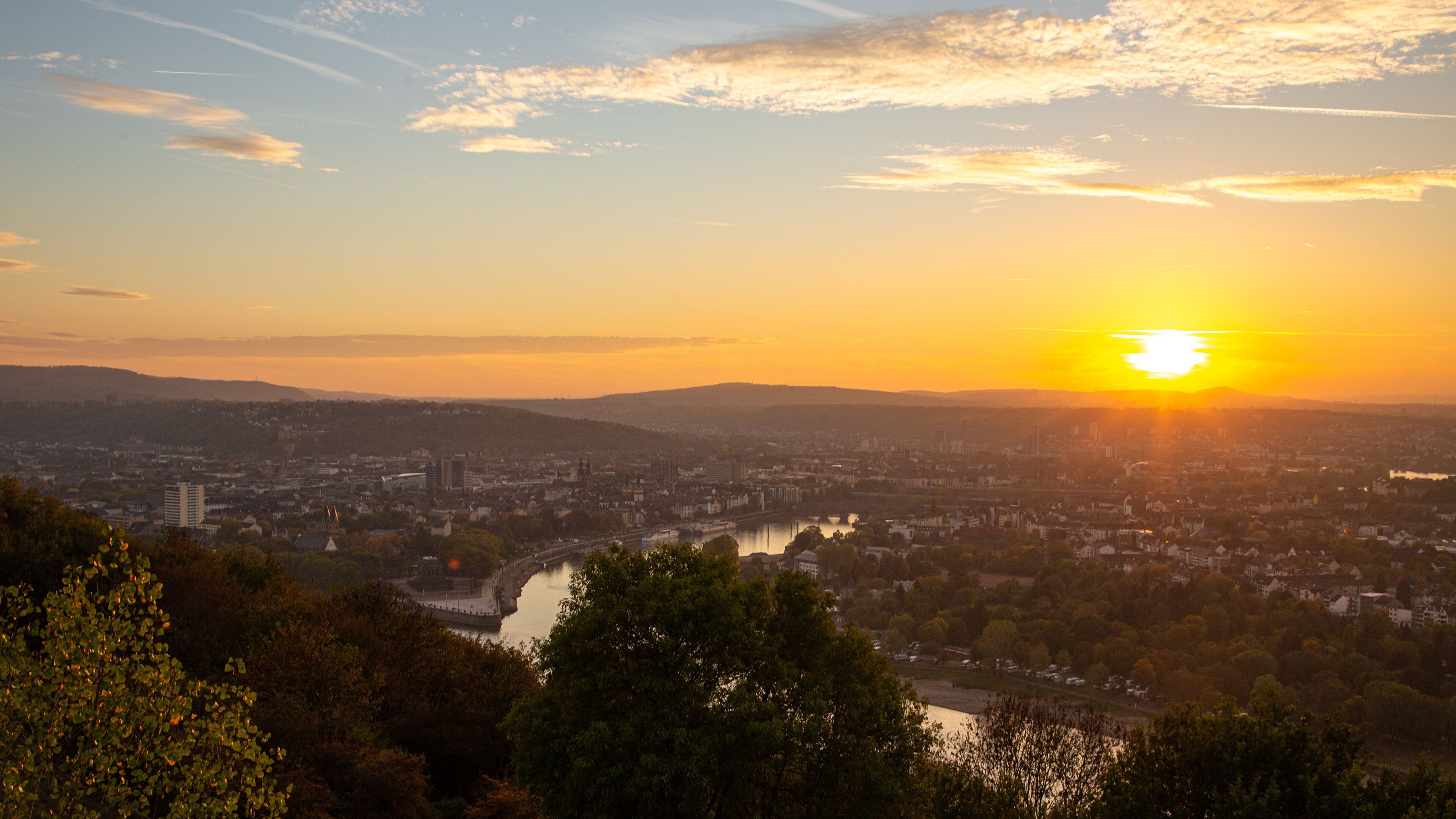 St Maarten and St Martin showing a city, landscape views and a sunset