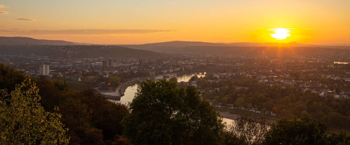 St Maarten and St Martin showing a city, landscape views and a sunset