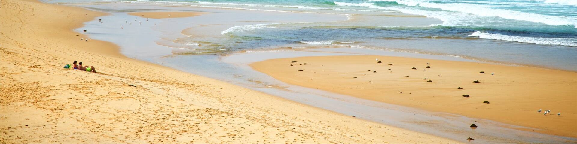 Short Point Recreation Reserve featuring a sandy beach, a bay or harbor and surf