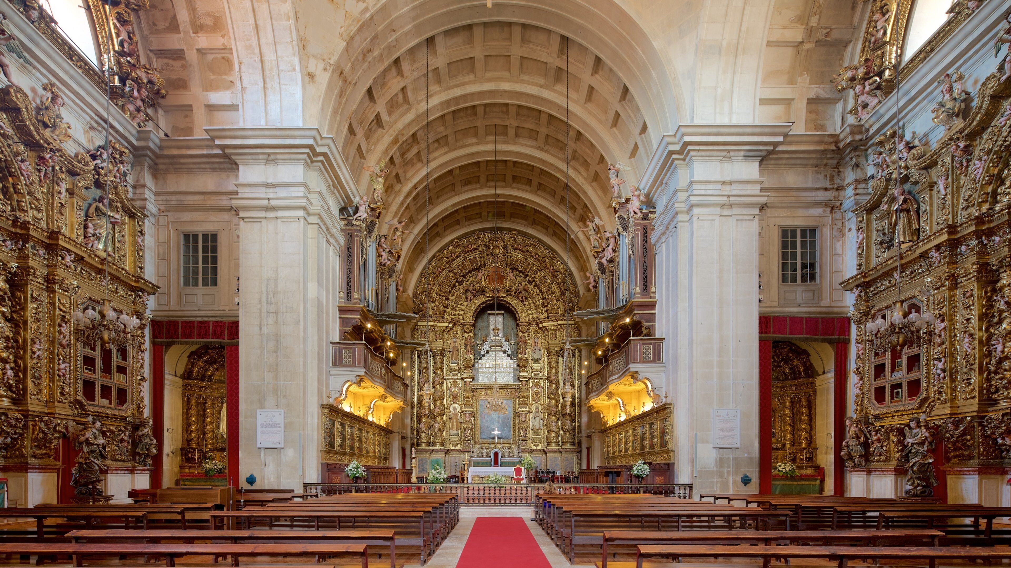 Coimbra which includes heritage elements, a church or cathedral and interior views