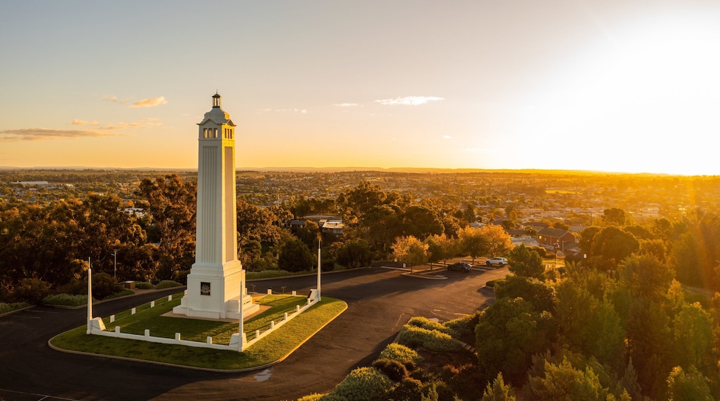 Memorial Hill Lookout which includes landscape views and a sunset