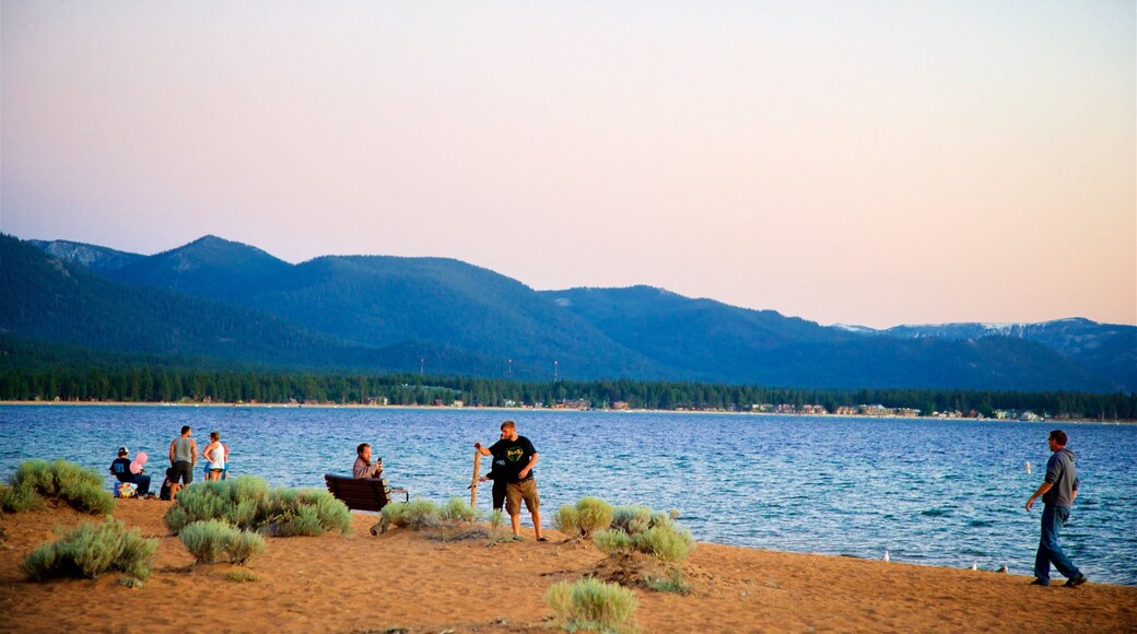 Nevada Beach which includes a sandy beach, a sunset and general coastal views