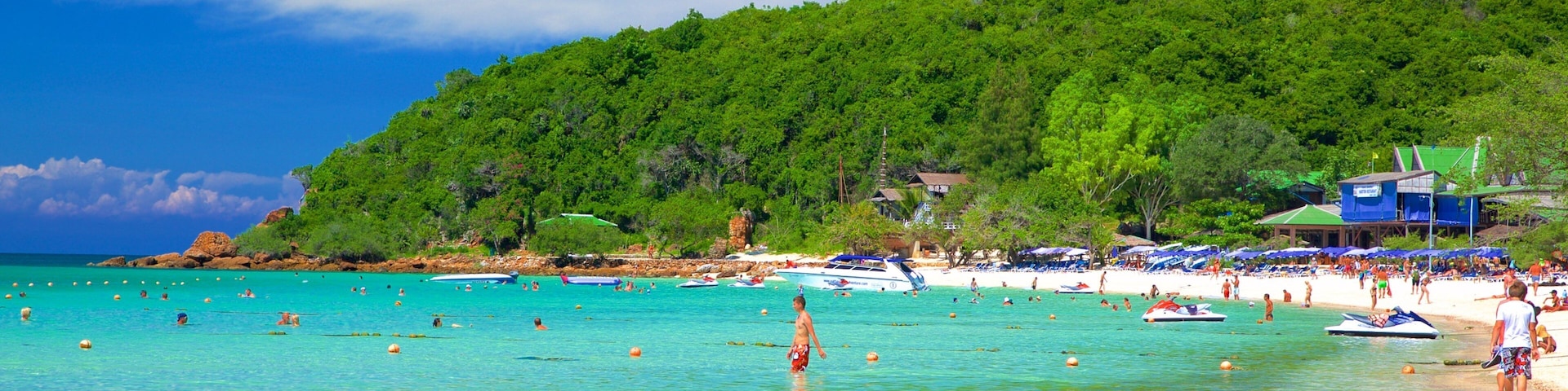 Koh Lan which includes general coastal views, swimming and a bay or harbor
