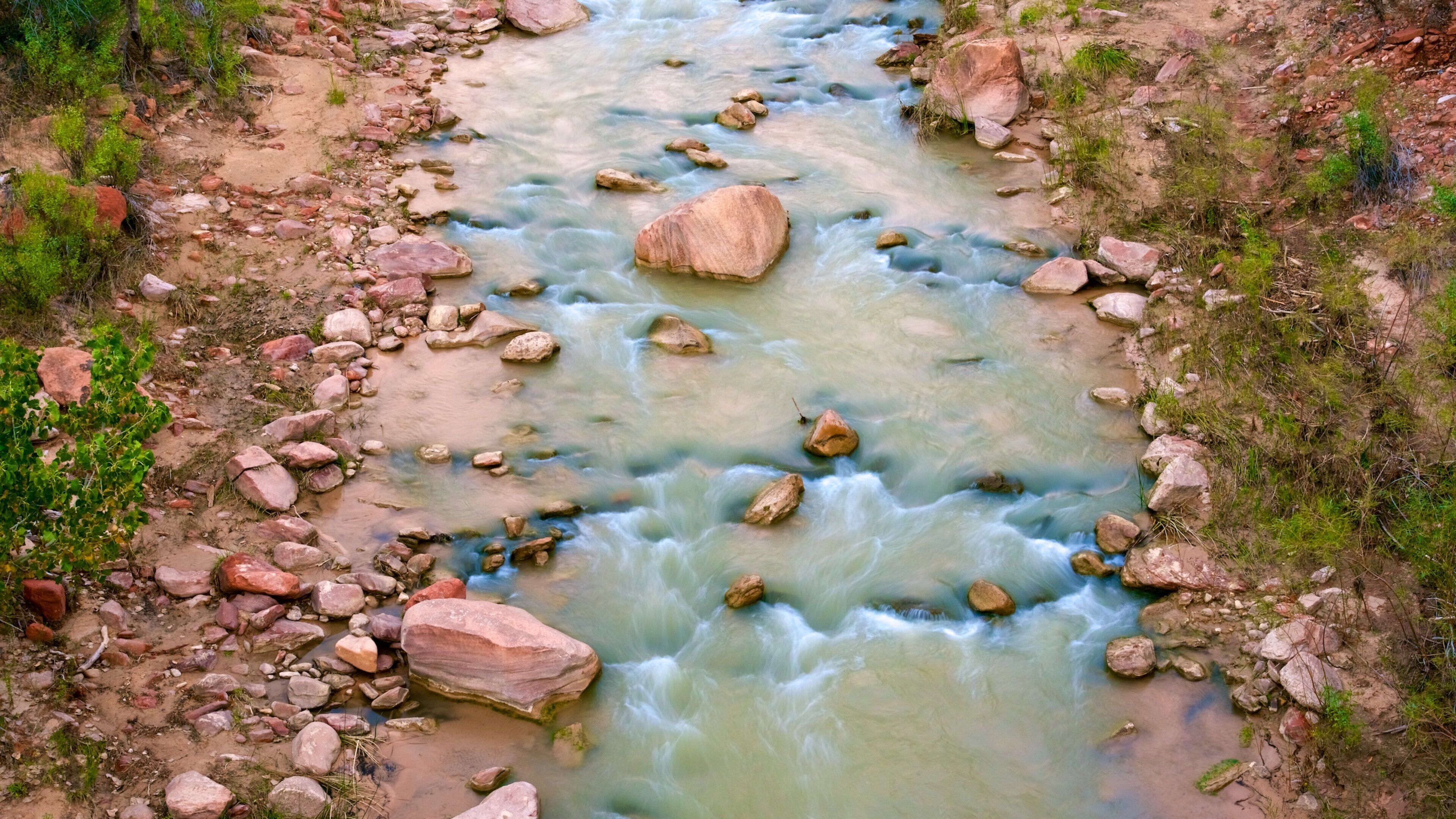 Canyon Junction featuring a river or creek