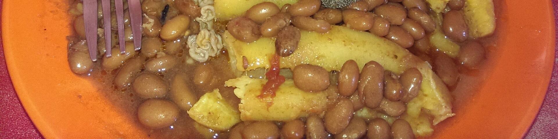 Breakfast of Champions in Uganda. Beans, Rice, Matoke....and animal intestines! God help me !!!!!