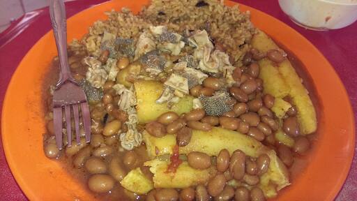 Breakfast of Champions in Uganda. Beans, Rice, Matoke....and animal intestines! God help me !!!!!