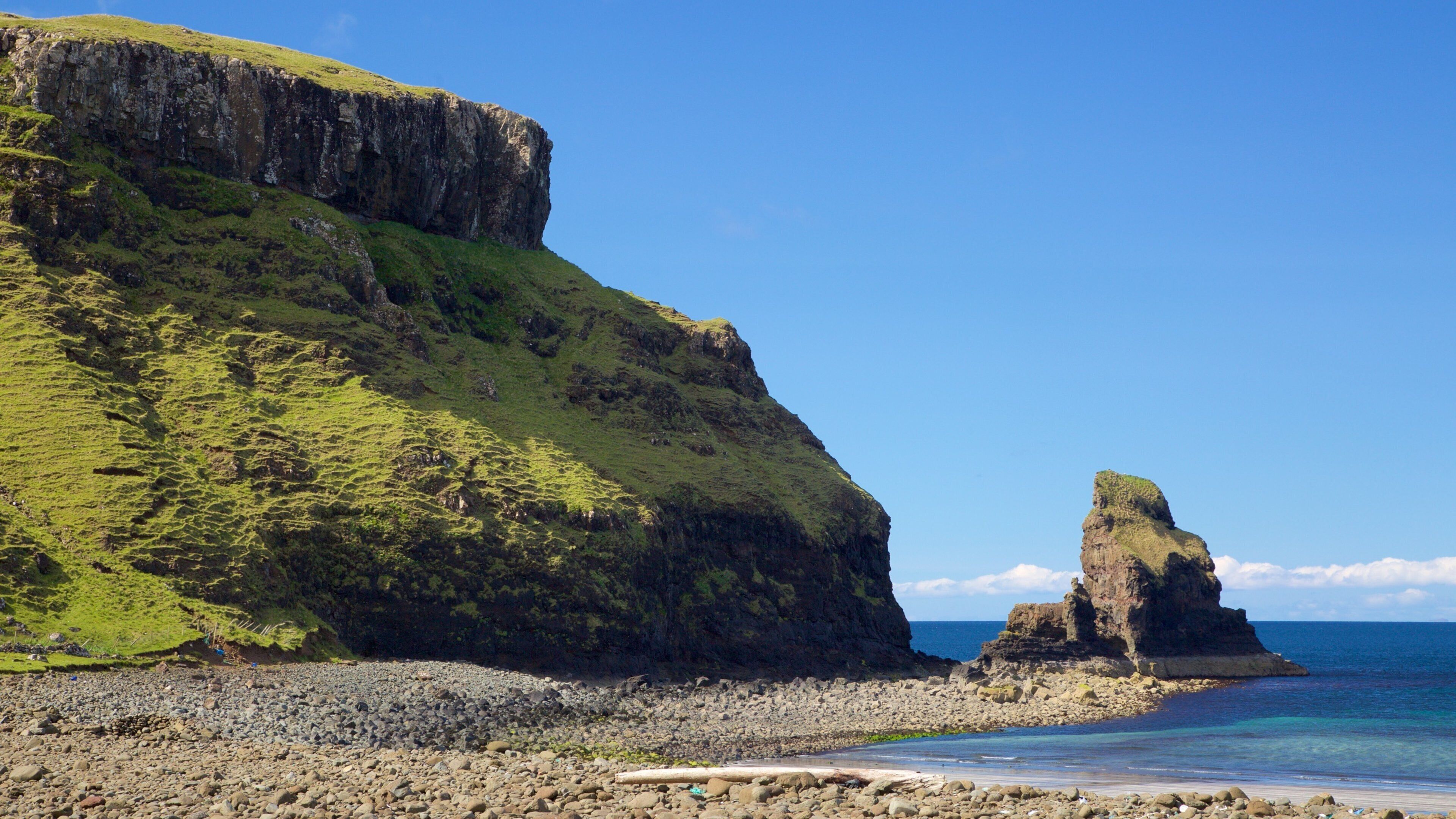 Isle of Skye som inkluderer rolig landskap, kyst og klippelandskap