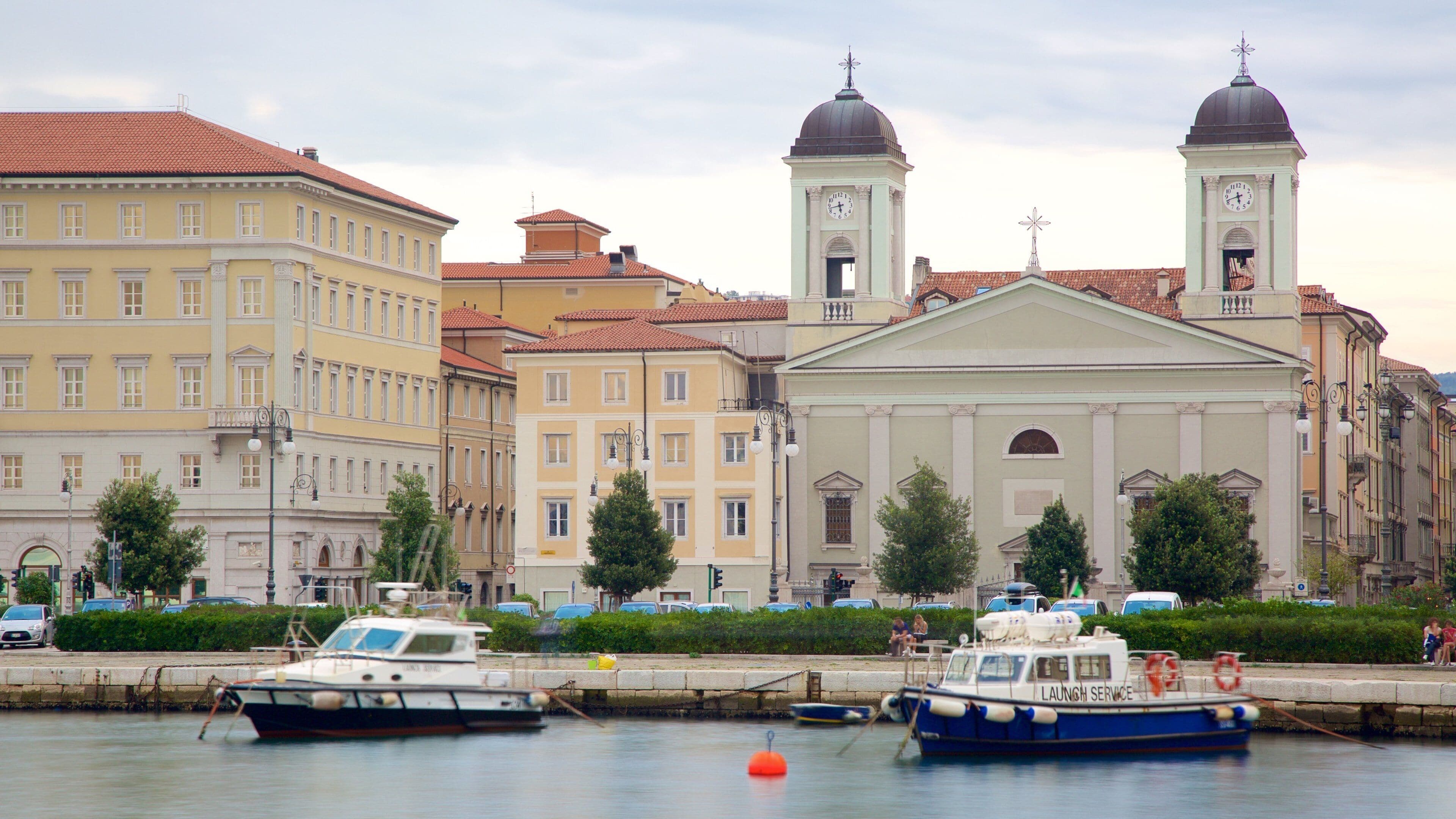 Trieste showing a sunset, a church or cathedral and religious aspects