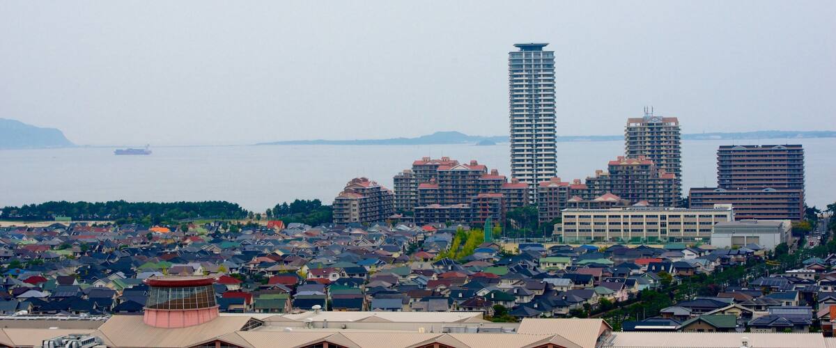 Kyushu and Okinawa which includes a city and general coastal views