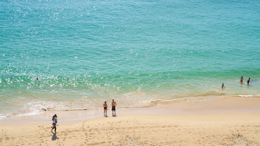 Portimao featuring swimming, a beach and general coastal views