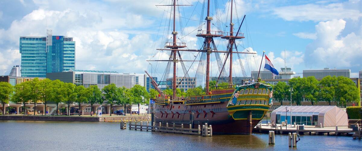 Amsterdam showing a bay or harbour and heritage elements