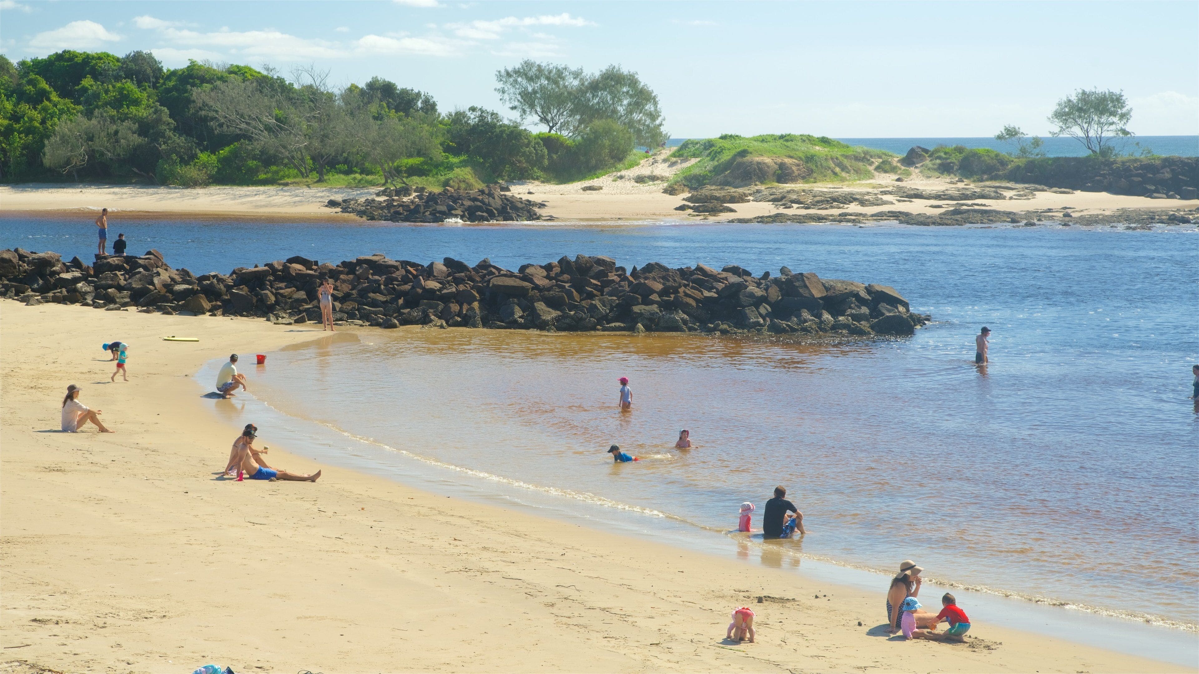 Brunswick Heads which includes a lake or waterhole as well as a family