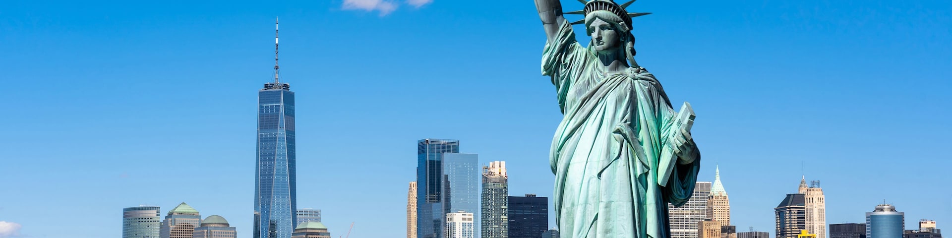 The Statue of Liberty over the Scene of New york cityscape river side which location is lower manhattan,Architecture and building with tourist concept