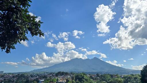 Beautiful landscape morning view of Mount Salak or Gunung Salak taken from batu tulis area in central Bogor city Indonesia
