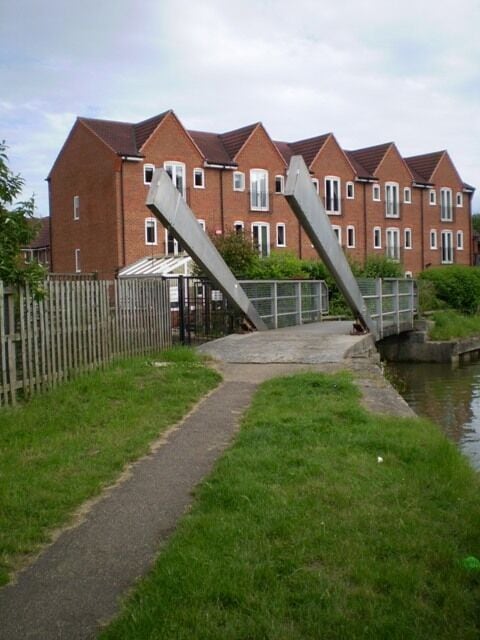 Lifting bridge on the Grand Union Canal Bridge 96A lifts to gives access across the towpath to a private marina