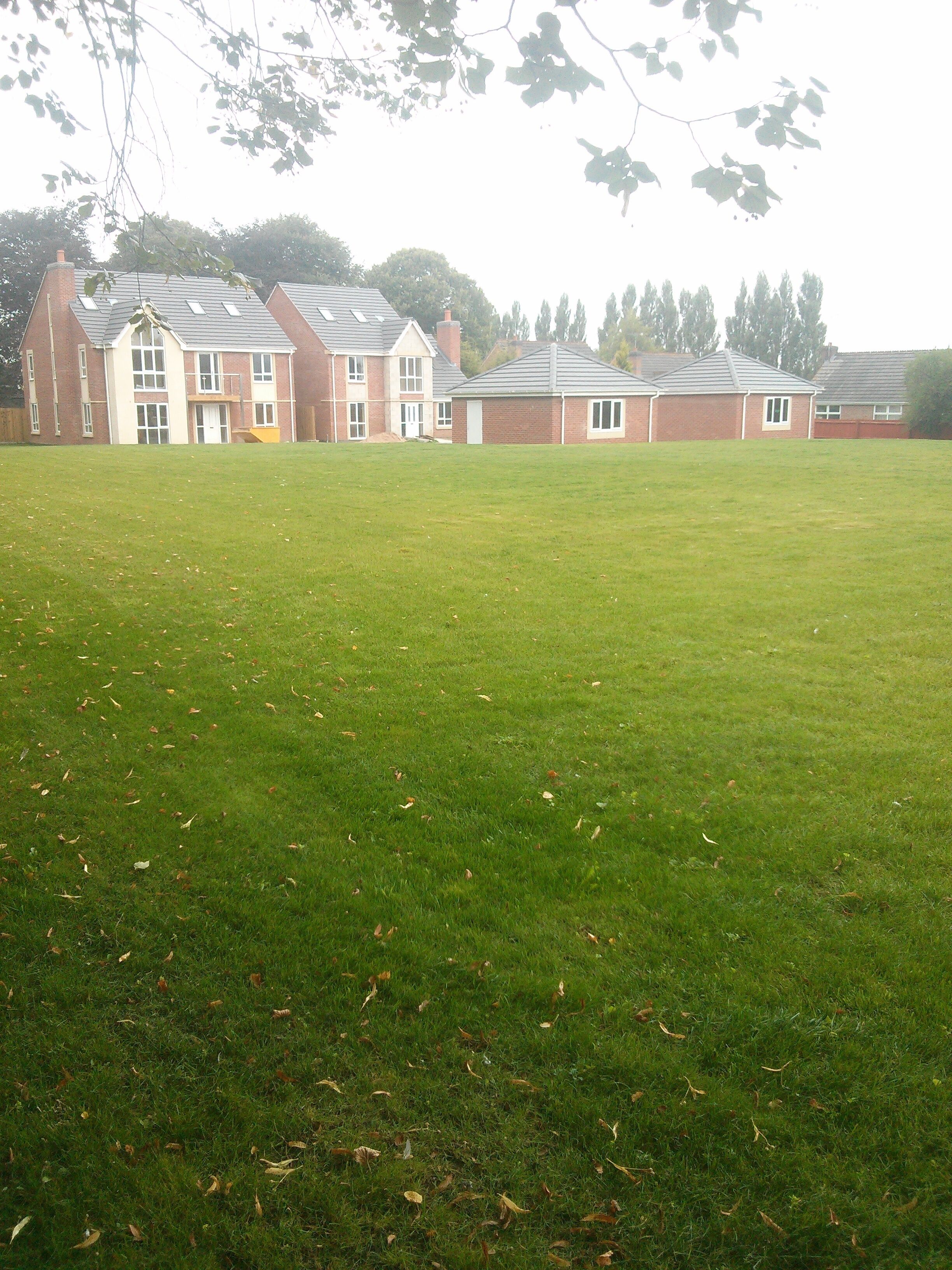 Section of Rykneld Street Roman road and remains of Bronze Age cemetery at Littleover - today it is lawned over and is an island in a development of new houses. Wikidata has entry Q17663256 with data related to this monument.