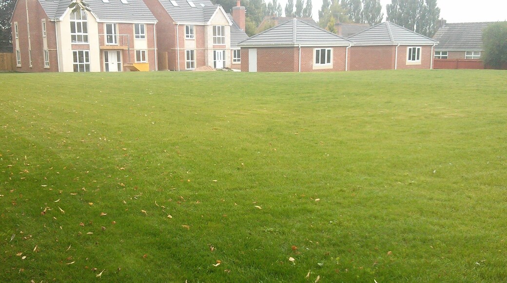 Section of Rykneld Street Roman road and remains of Bronze Age cemetery at Littleover - today it is lawned over and is an island in a development of new houses. Wikidata has entry Q17663256 with data related to this monument.
