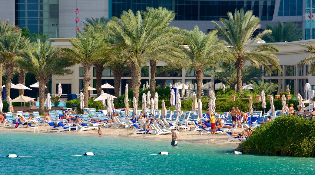 Al Danah featuring swimming, a beach and a hotel