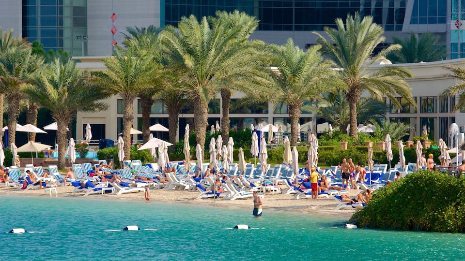 Al Danah featuring swimming, a beach and a hotel