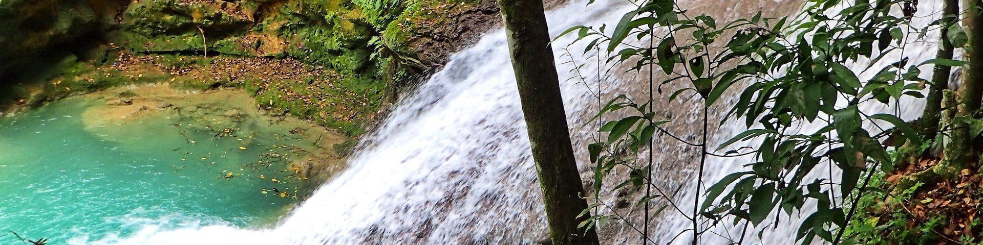 Better than Dunns River Falls. Rope swings, jump off the falls into amazing turquoise blue water. Far fewer people
