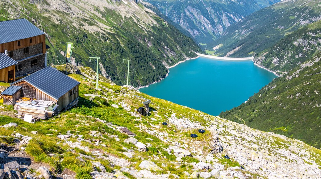 Alpine valley and mountain hut