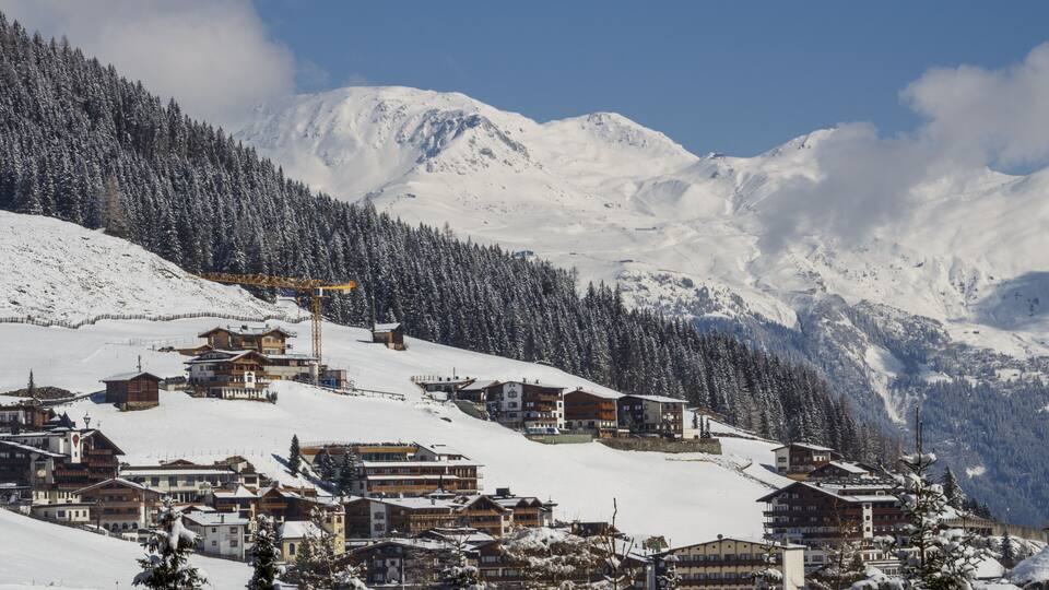 Buildings in Hintertux at the valley station of the cableway to the Hintertuxer Glacier (Tuxer Ferner) in Tyrol, Austria; Shutterstock ID 572945836