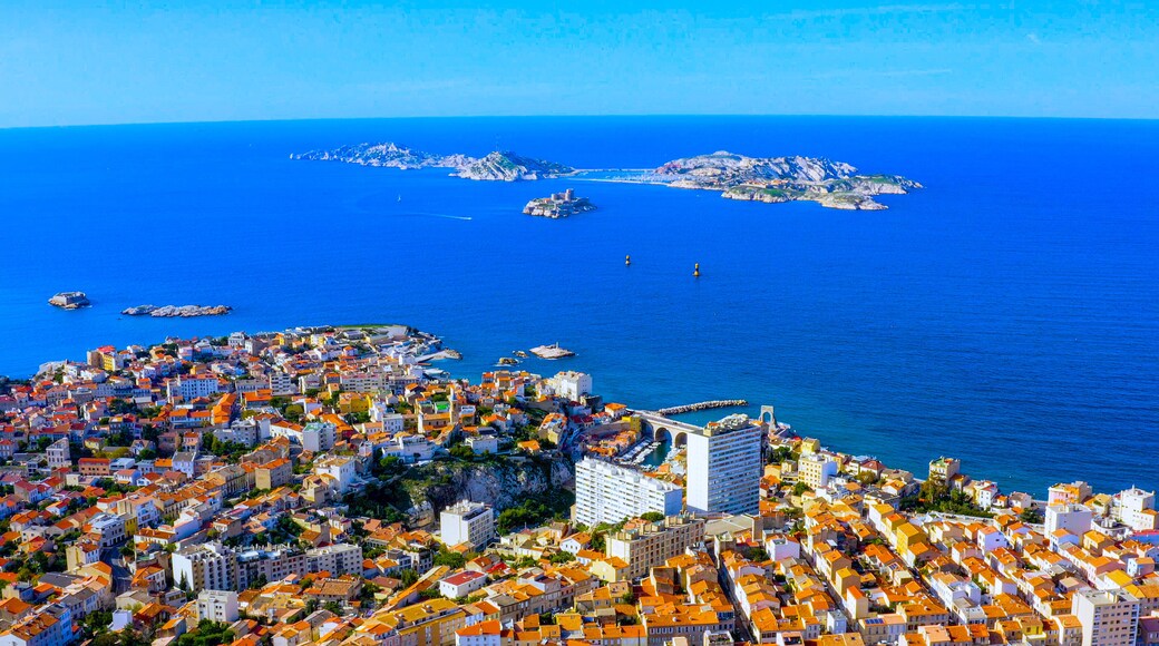 Aerial view of Marseille coastline with residential districts, Chateau d'If and Frioul Islands in the Mediterranean Sea, France