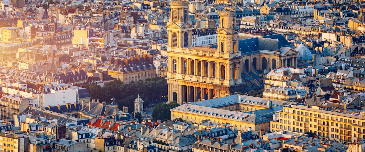 Saint Sulpice Church highlighted by the sun. Built in 1754 Eglise Saint-Sulpice is one of the biggest churches in Paris. Saint-Germain-des-Pres district, Place Saint-Sulpice, Paris, France