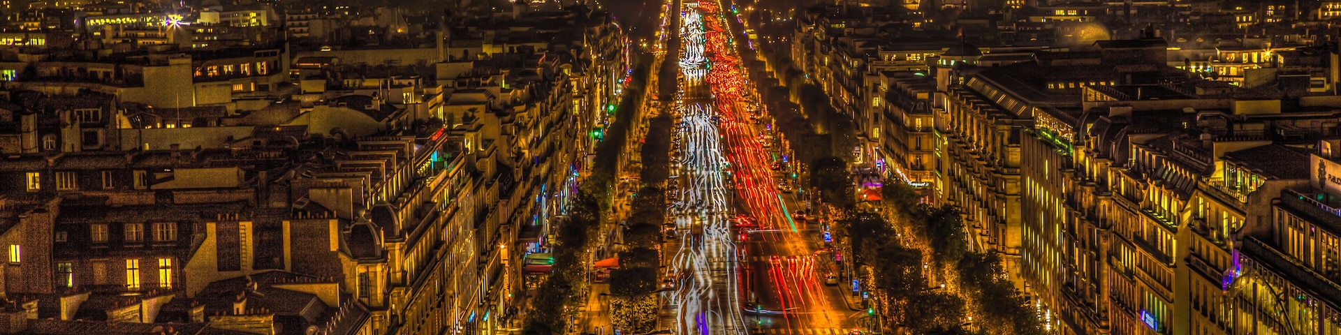 Cityscape of Paris at night, view on the Champs-Elysees.