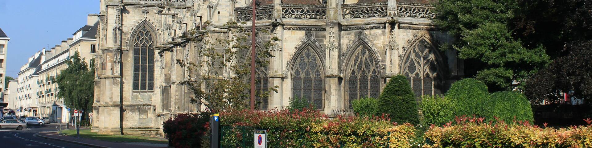 A historic cathedral with intricate Gothic architecture, including pointed arches and detailed stonework.