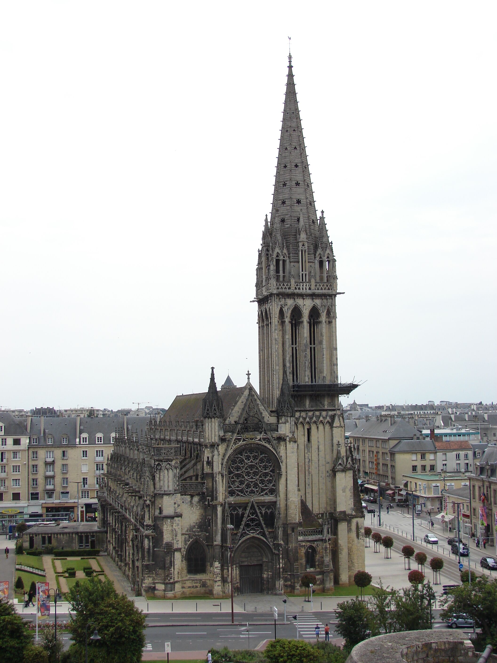 A Gothic cathedral with a tall spire and intricate facade.