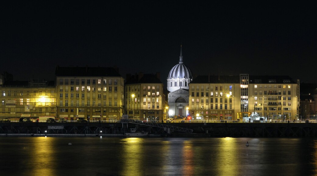 Night view of quai de la Fosse (and its titled buildings) and Notre-Dame de Bon-Port church - Nantes, France