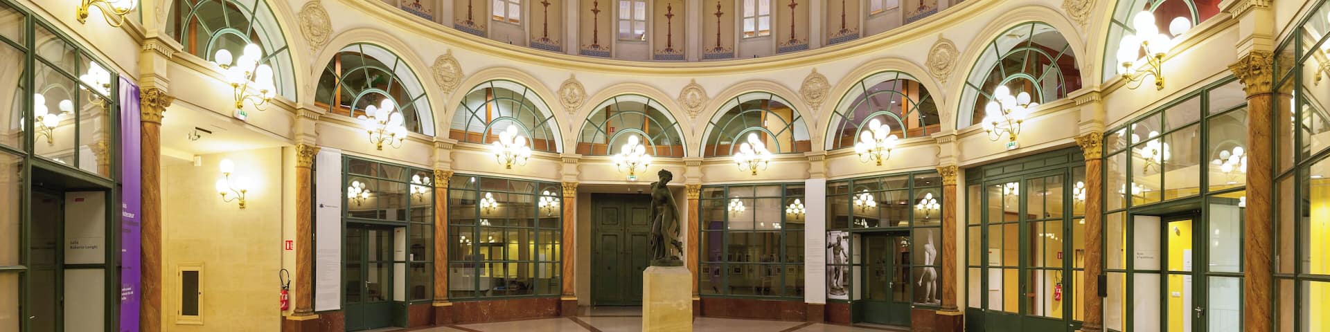 Rotunda of the Galerie Colbert (Colbert Galleria), Paris, 2nd arrondissement. Built in 1826 as a rival to the adjacent and then very popular Vivienne covered passage, it never was as succesful and was almost abandoned until renovation in the 1980s. Bought by French National Library, the galerie is now home to INHA (Institut National de l'Histoire des Arts, Art History National Institute) and INP (Institut National du Patrimoine, Heritage National Institute).