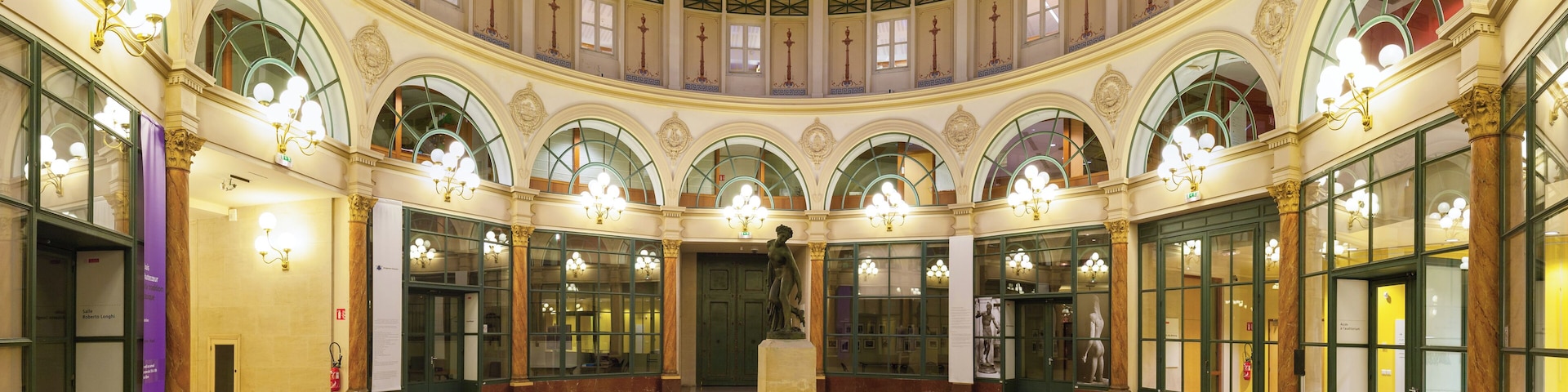 Rotunda of the Galerie Colbert (Colbert Galleria), Paris, 2nd arrondissement. Built in 1826 as a rival to the adjacent and then very popular Vivienne covered passage, it never was as succesful and was almost abandoned until renovation in the 1980s. Bought by French National Library, the galerie is now home to INHA (Institut National de l'Histoire des Arts, Art History National Institute) and INP (Institut National du Patrimoine, Heritage National Institute).