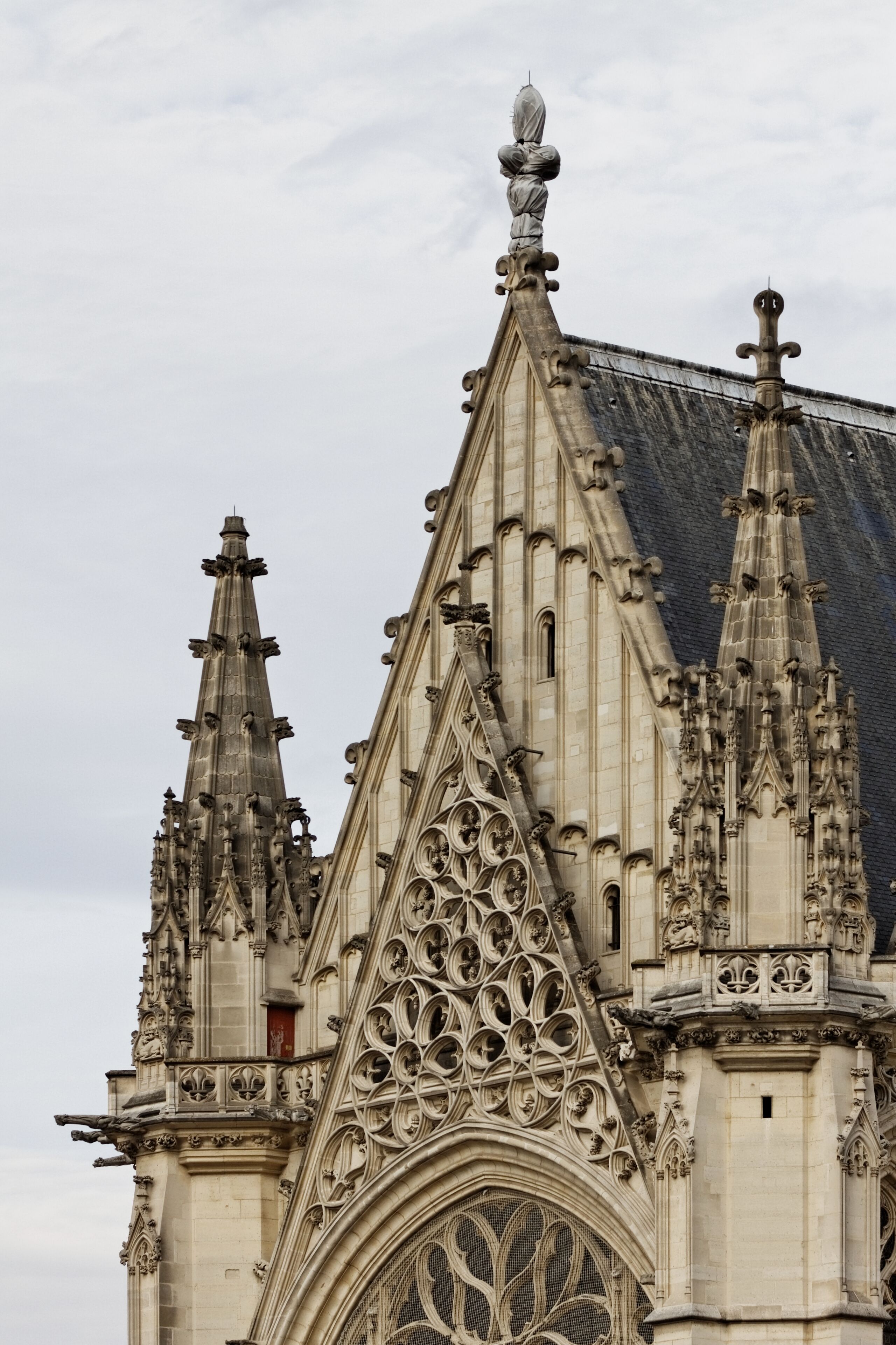 A Gothic-style cathedral with intricate stone carvings and pointed spires.