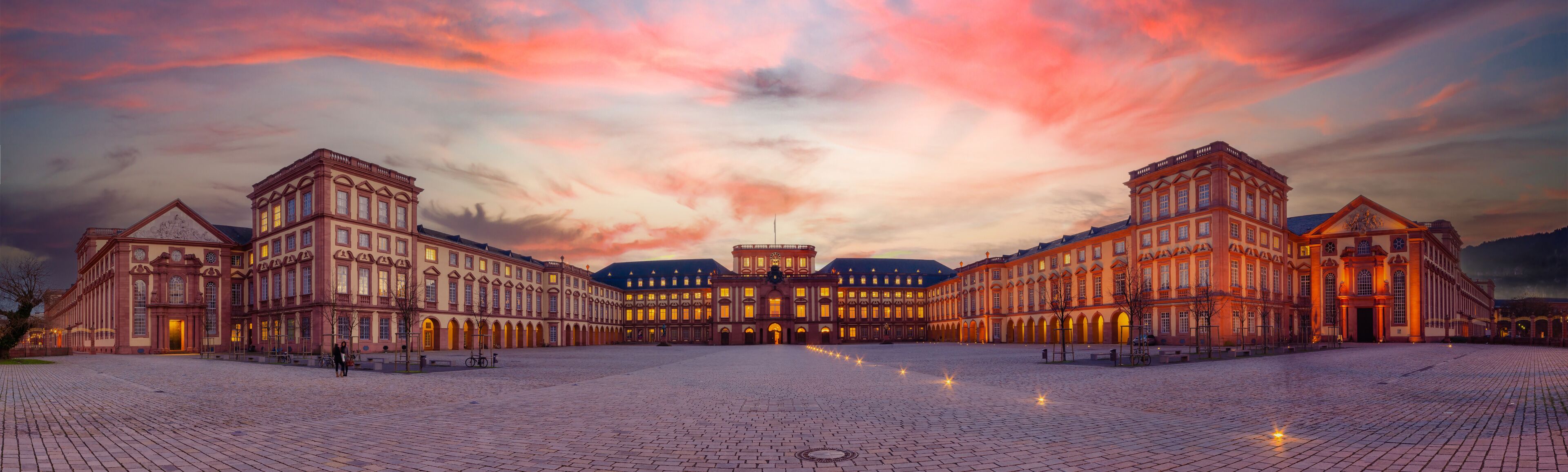 Mannheim, Germany. Panoramic view of the Baroque Palace of Mannheim at sunset. Here are located the University and a Historic Museum. 2013-02-07.