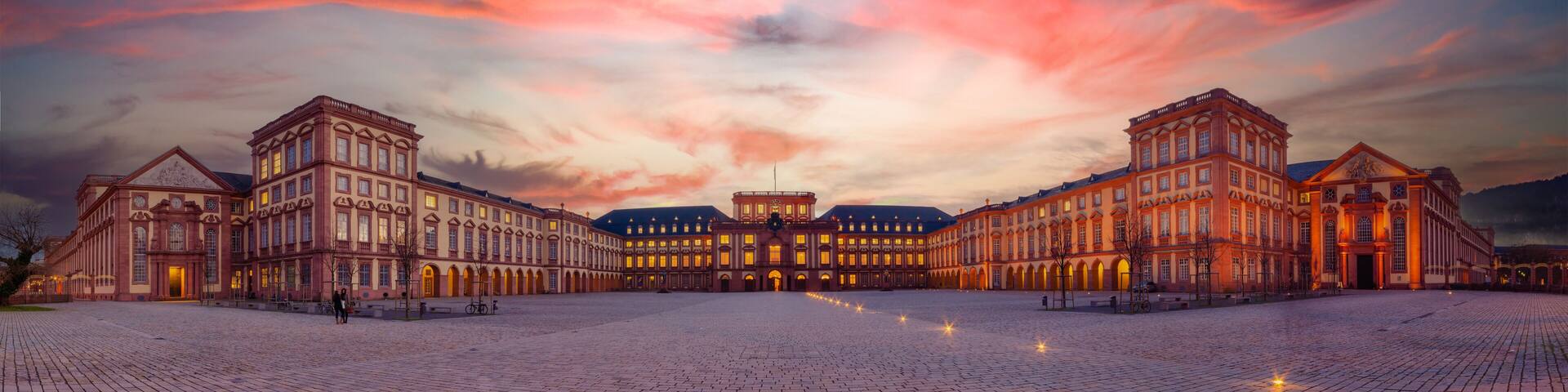 Mannheim, Germany. Panoramic view of the Baroque Palace of Mannheim at sunset. Here are located the University and a Historic Museum. 2013-02-07.