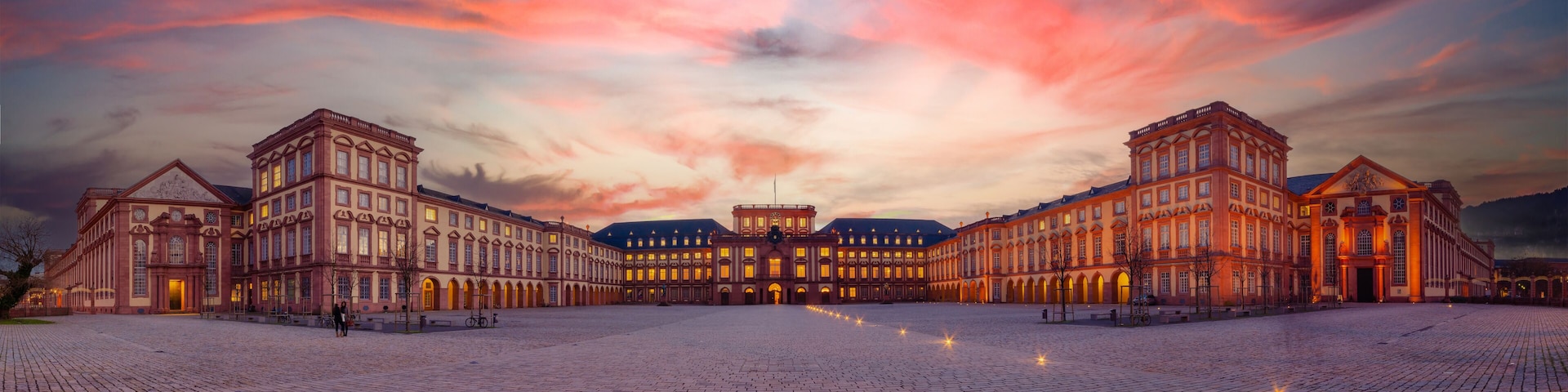 Mannheim, Germany. Panoramic view of the Baroque Palace of Mannheim at sunset. Here are located the University and a Historic Museum. 2013-02-07.