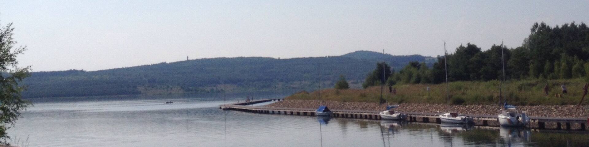 Try to check this little port on this lake. Clear water here and no people. F beach 😊