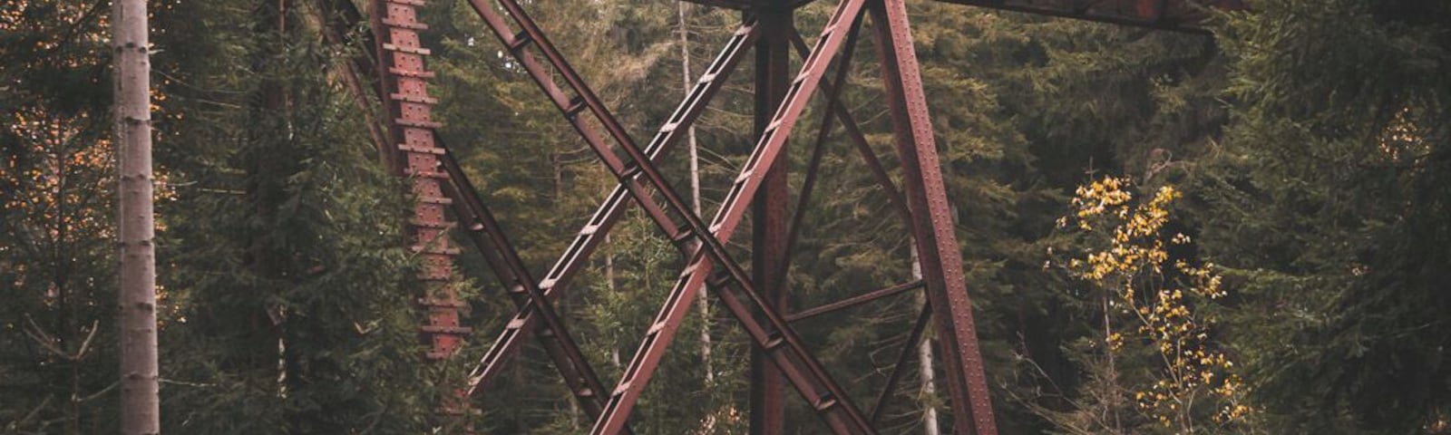 old, little trainbridge made out of metal
not in use anymore
hidden in the forest
