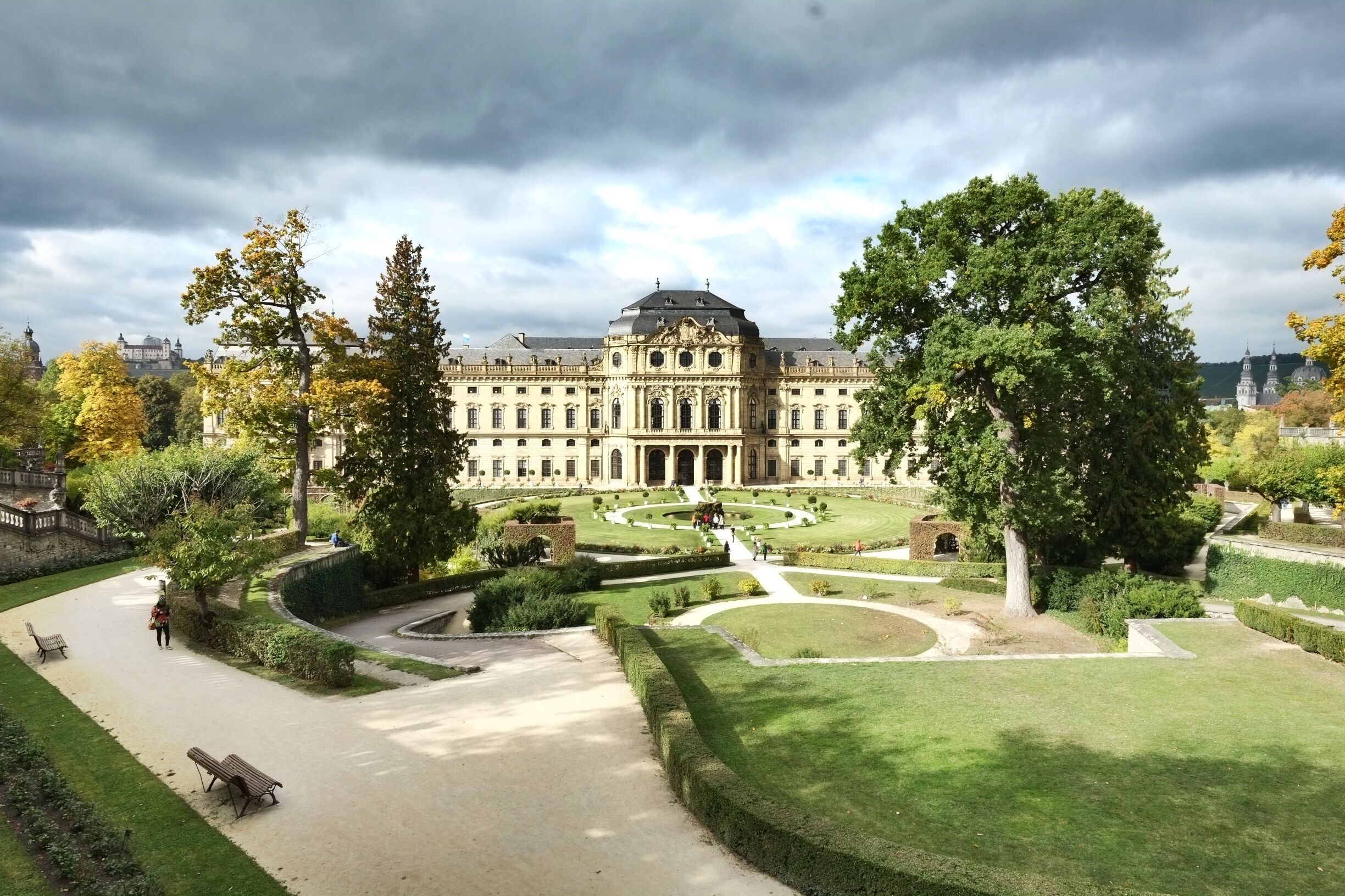 The Würzburg Residence is a palace in Würzburg, Germany. Johann Lukas von Hildebrandt and Maximilian von Welsch, representatives of the Austrian/South German Baroque style, were involved in the construction, as well as Robert de Cotte and Germain Boffrand, who were followers of the French Style. Balthasar Neumann, court architect of the Bishop of Würzburg, was the principal architect of the Residence, which was commissioned by the Prince-Bishop of Würzburg Johann Philipp Franz von Schönborn and his brother Friedrich Carl von Schönborn in 1720, and completed in 1744. The Venetian painter Giovanni Battista Tiepolo, assisted by his son, Domenico, painted frescoes in the building. Since 1981, the Residence has been a UNESCO World Heritage Site.