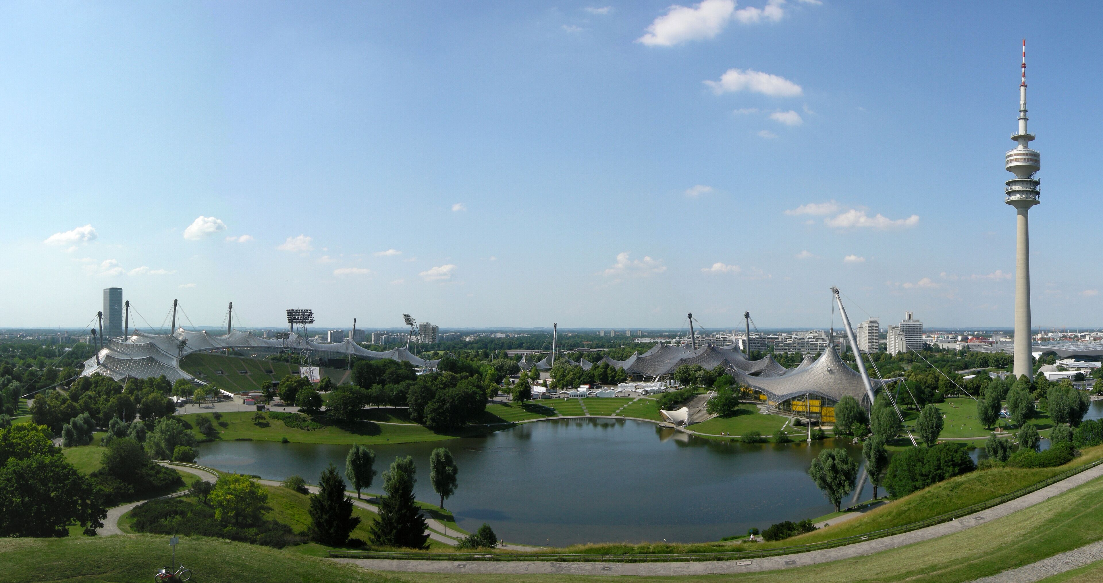 view from Olympic Hill of Olympic Park in Munich; from left to right: Olympic Stadium, Olympic Hall, Olympic Swim Hall and Olympic Tower (291 m)